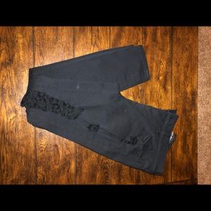 Women’s Express destroyed black jeggings. Size 12.